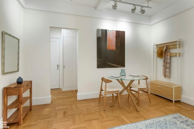 dining area with light parquet flooring