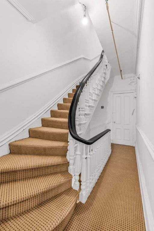 entryway with parquet flooring