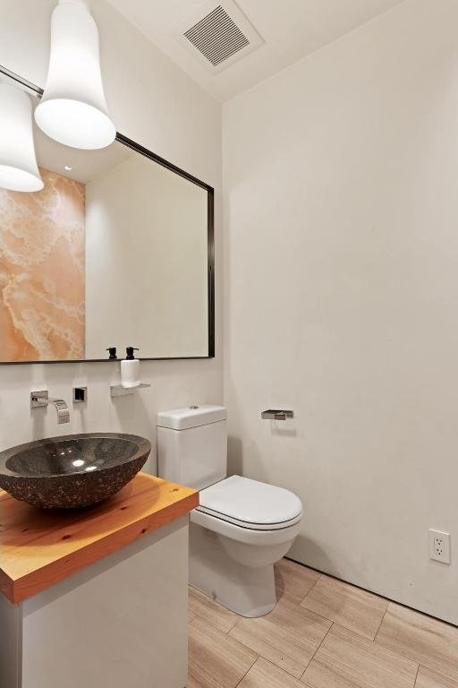 bathroom with toilet and sink