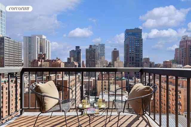 balcony featuring a view of city