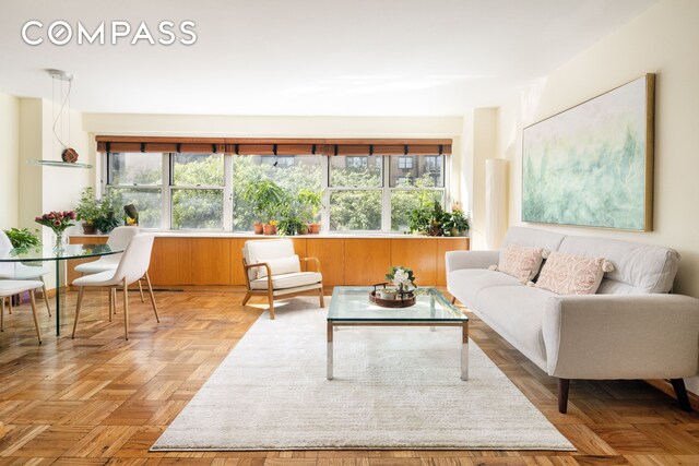 interior space featuring light parquet flooring and plenty of natural light