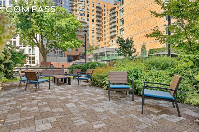 view of home's community with a patio