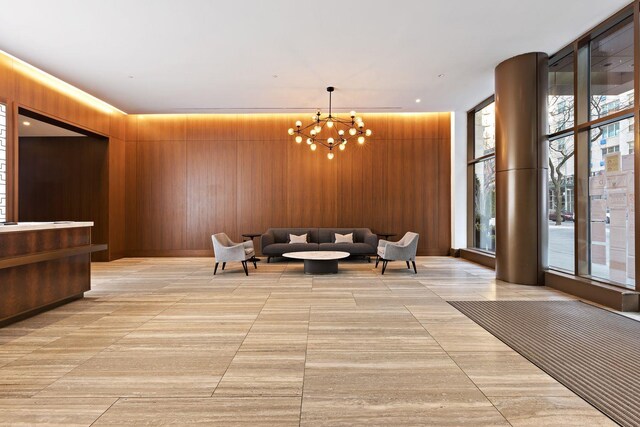 building lobby featuring wood walls