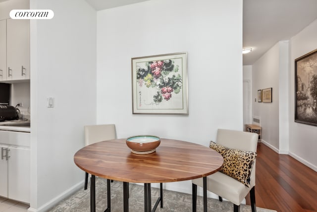 dining room featuring light wood-type flooring