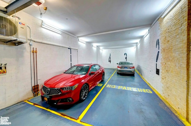 garage featuring ac unit