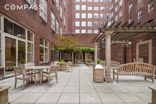 view of patio featuring outdoor dining area and a pergola