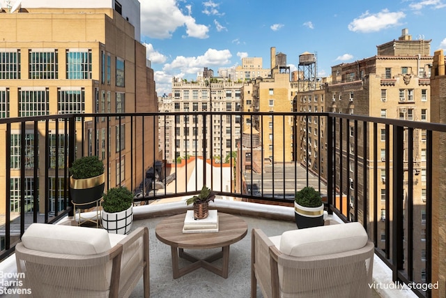 balcony featuring a city view