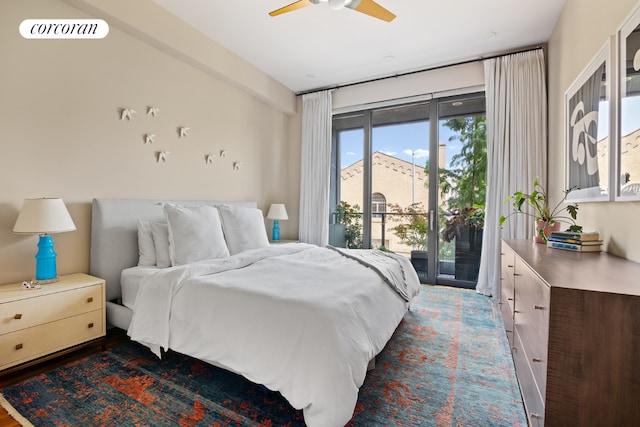 bedroom with ceiling fan, access to exterior, and hardwood / wood-style floors