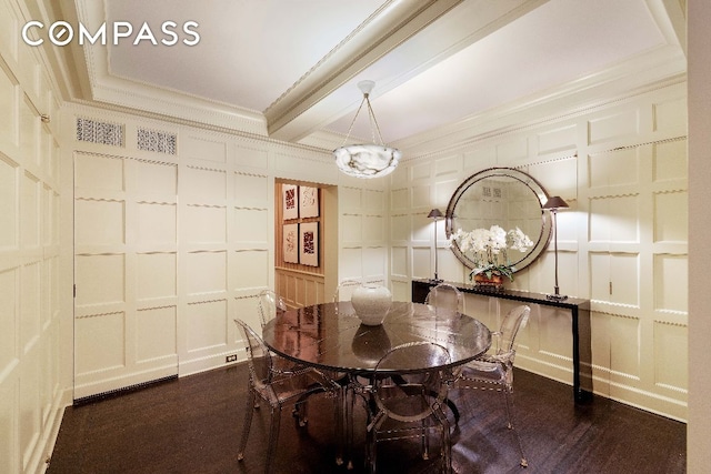 dining room with beamed ceiling, crown molding, and dark hardwood / wood-style flooring