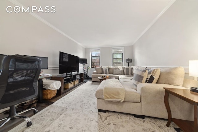 living room with lofted ceiling and crown molding