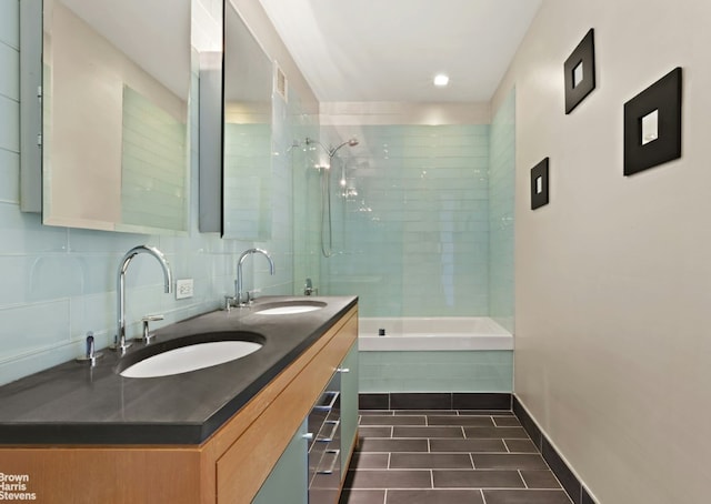 bathroom featuring tasteful backsplash and vanity