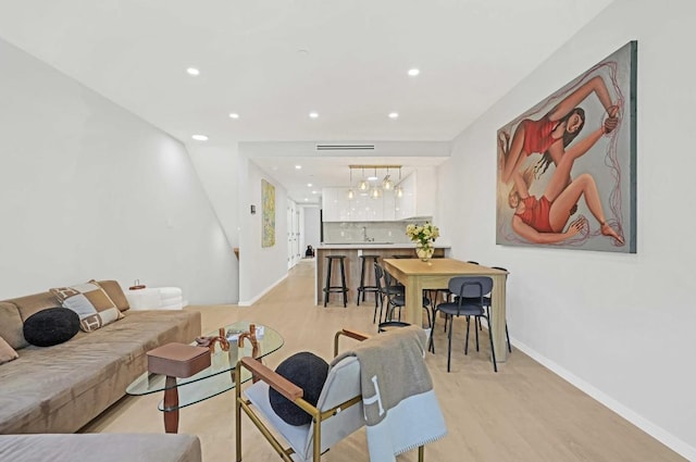 living room featuring light wood-type flooring