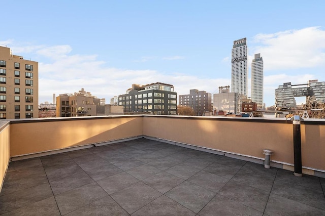 balcony featuring a city view