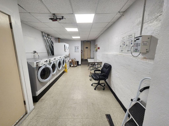 laundry area with independent washer and dryer