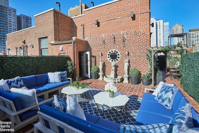 419 E 57th St Unit Ph16C, New York City, NY 10022 - view of patio / terrace with outdoor lounge area