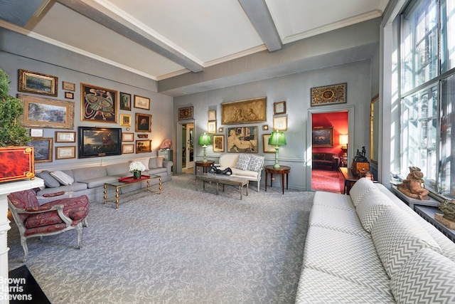 living room featuring beamed ceiling, carpet, and crown molding