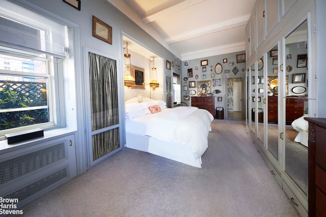 419 E 57th St Unit Ph16C, New York City, NY 10022 - bedroom featuring light colored carpet, beam ceiling, and radiator heating unit
