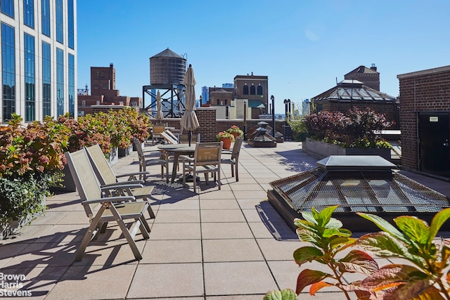 419 E 57th St Unit Ph16C, New York City, NY 10022 - view of patio featuring a view of city