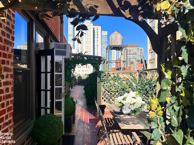 view of patio with a city view