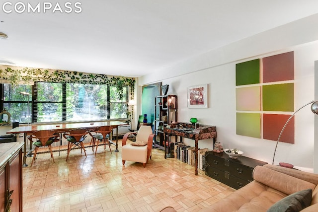 living room featuring light parquet flooring