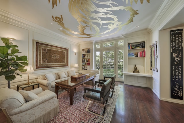 sitting room featuring crown molding, built in features, and dark hardwood / wood-style floors