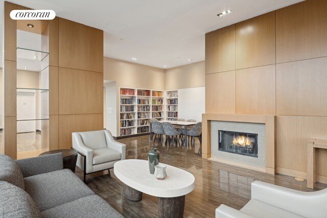 425 Main St Unit 12D, New York City, NY 10044 - living room with a glass covered fireplace and wood finished floors