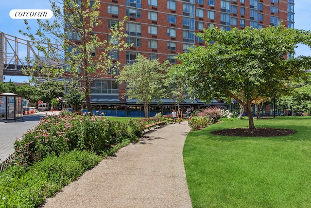 view of home's community featuring a yard