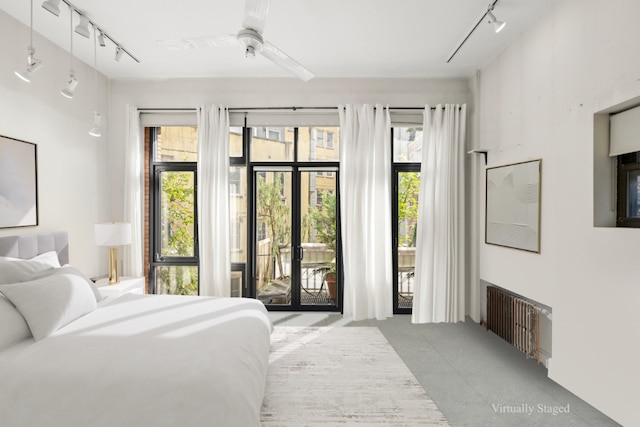 tiled bedroom featuring radiator heating unit, access to outside, and ceiling fan