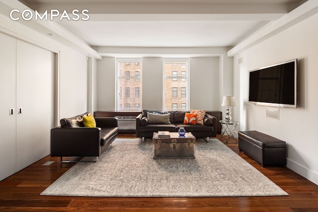 living area featuring dark wood-style floors