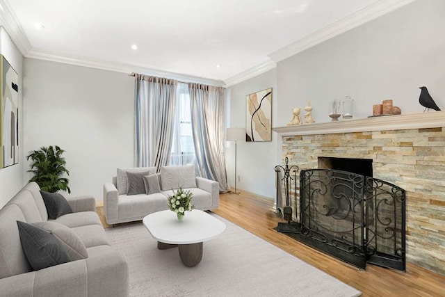 57 E 75th St Unit 2R, New York City, NY 10021 - living room featuring wood finished floors, a stone fireplace, and crown molding