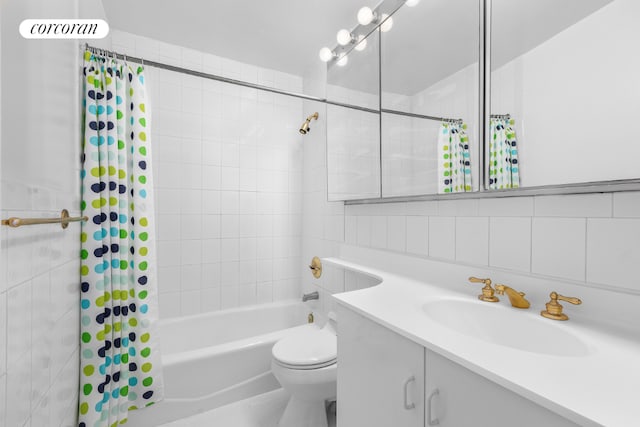 full bathroom featuring shower / bathtub combination with curtain, tile walls, backsplash, vanity, and toilet