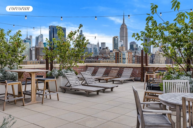 view of patio / terrace featuring a view of city