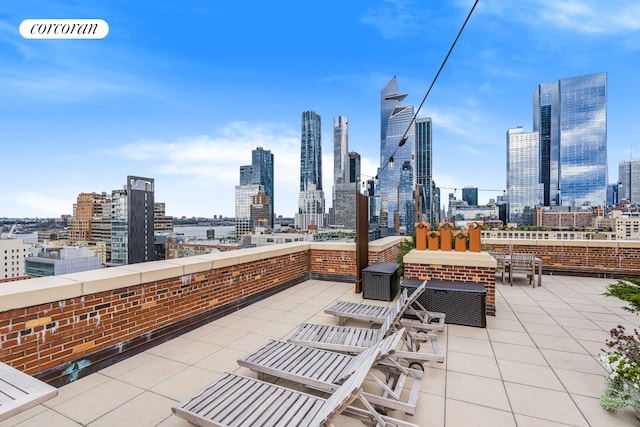 view of patio / terrace featuring a view of city