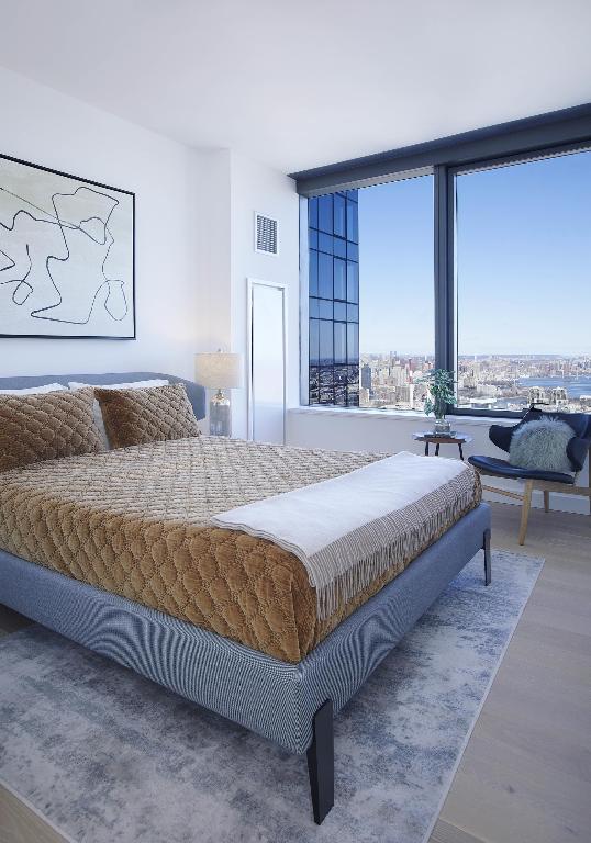 bedroom featuring hardwood / wood-style flooring