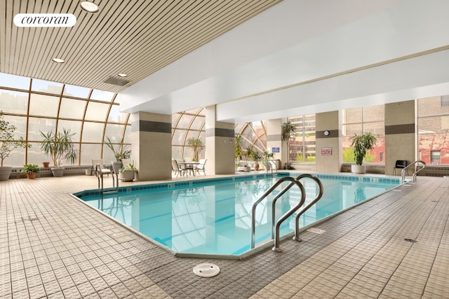 view of swimming pool with a patio area