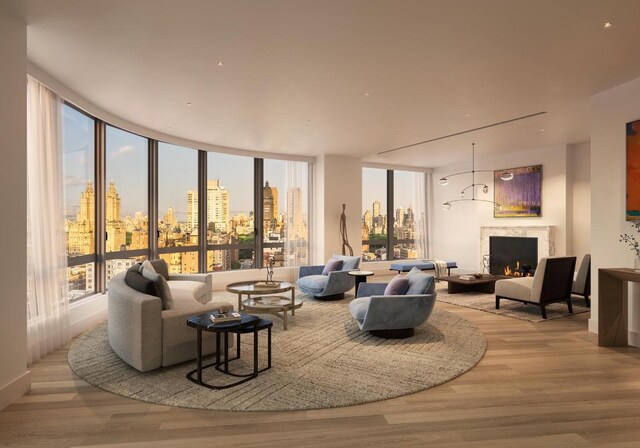 living room featuring light hardwood / wood-style flooring and expansive windows