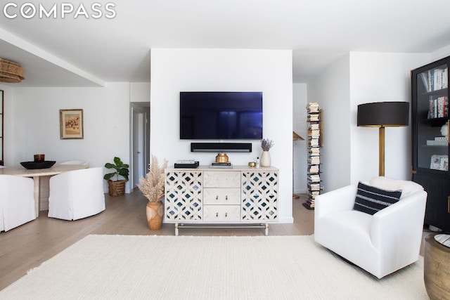 living area featuring wood finished floors