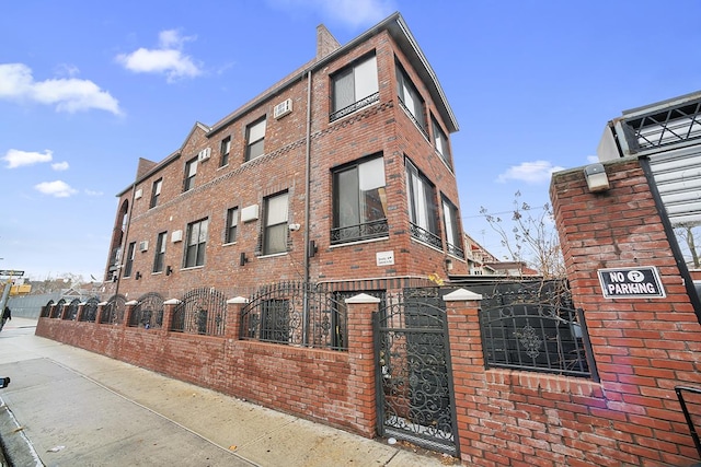 view of property featuring fence