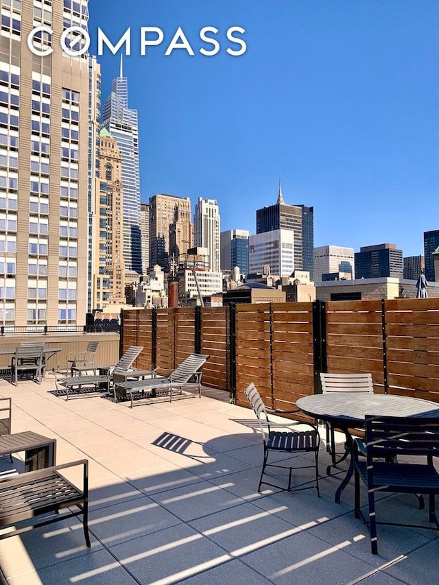 view of patio with a city view