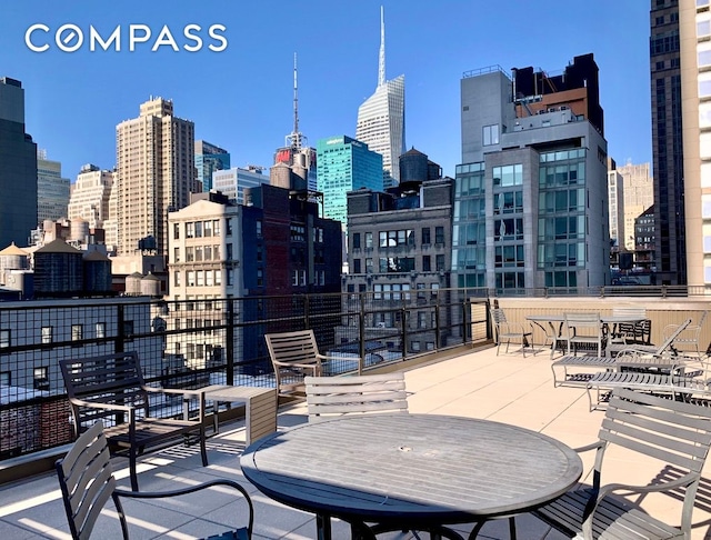 view of patio with a city view