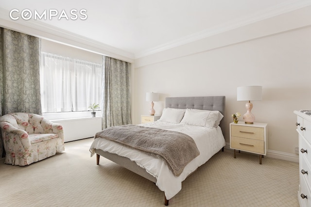 bedroom with baseboards, light carpet, and ornamental molding