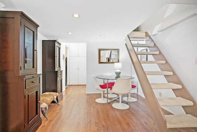 dining area with stairway, recessed lighting, and light wood-style flooring