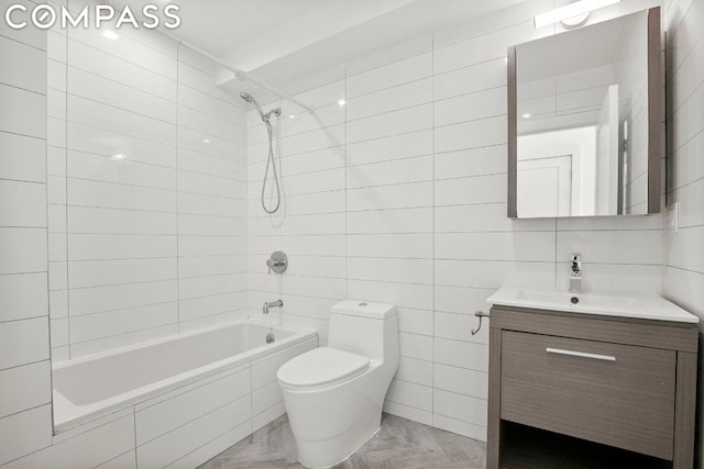 full bathroom with parquet flooring, toilet, tile walls, vanity, and tiled shower / bath combo