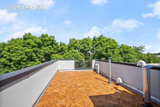 basement with light hardwood / wood-style floors