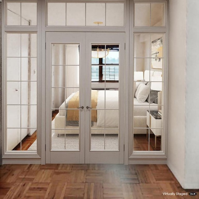 entryway featuring parquet floors