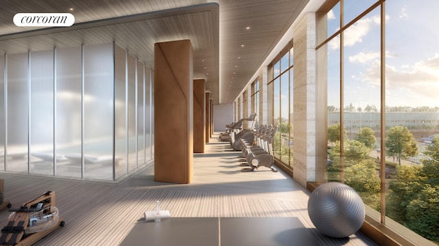 workout area with expansive windows