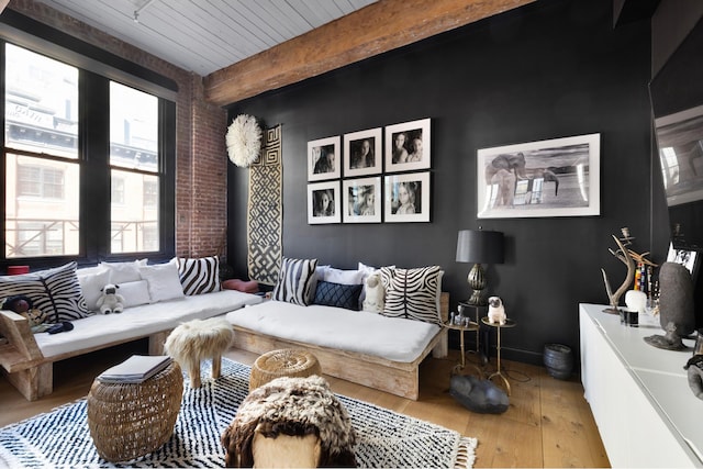 31 Washington St Unit 11, New York City, NY 11201 - living room featuring hardwood / wood-style flooring, brick wall, and a wooden ceiling with exposed beams