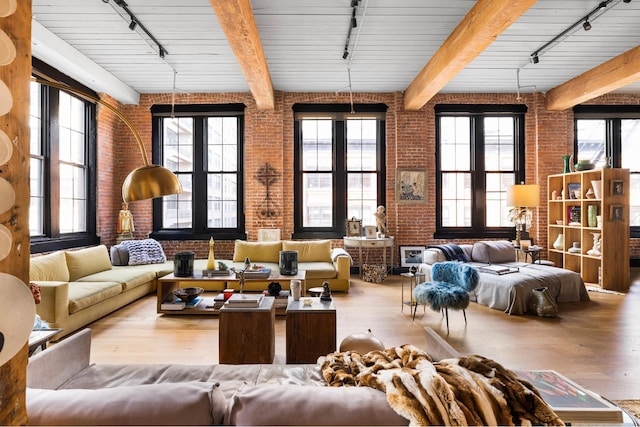 31 Washington St Unit 11, New York City, NY 11201 - sunroom featuring rail lighting and beamed ceiling