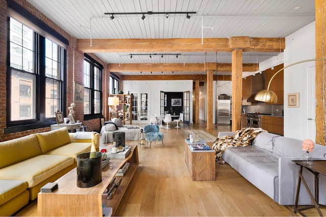 31 Washington St Unit 11, New York City, NY 11201 - lobby with beam ceiling, brick wall, and a high ceiling