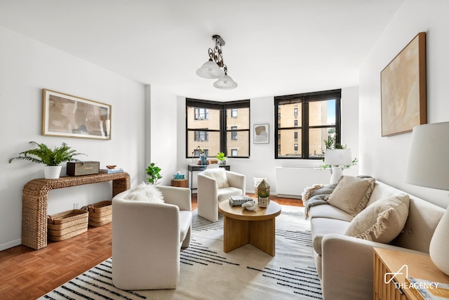 living room featuring baseboards